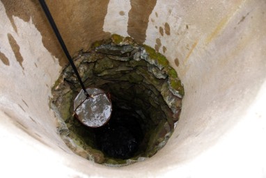 raising bucket in water well